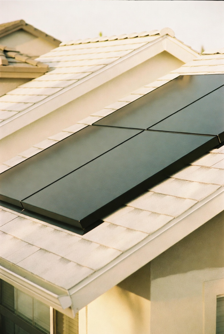 Seamless roof-integrated solar panel array close-up